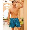 imageBRISIRA Mens Swim Trunks Bathing Suit 5 Inch Inseam Compression Liner Beach Swim Shorts Swimwear Quick Dry Zipper PocketGreentropical