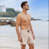 imageBRISIRA Mens Swim Trunks Bathing Suit 5 Inch Inseam Compression Liner Beach Swim Shorts Swimwear Quick Dry Zipper PocketLightkhaki