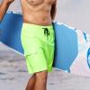 imageBRISIRA Mens Swim Trunks 9 Inch Inseam Board Shorts with Compression Liner Swimsuit Bathing Suit Quick Dry Cargo PocketFluorescent Green