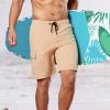 imageBRISIRA Mens Swim Trunks 9 Inch Inseam Board Shorts with Compression Liner Swimsuit Bathing Suit Quick Dry Cargo PocketKhaki