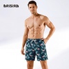 image:imageBRISIRA Mens Swim Trunks Swim Shorts 7 inch Compression Liner Bathing Suit Beach Shorts Swimwear Stretch Quick Dry PocketsBlue Flamingo Leaf