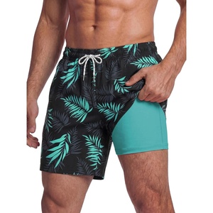 image:imageBRISIRA Mens Swim Trunks Swim Shorts 7 inch Compression Liner Bathing Suit Beach Shorts Swimwear Stretch Quick Dry PocketsBlack Blue Leaf